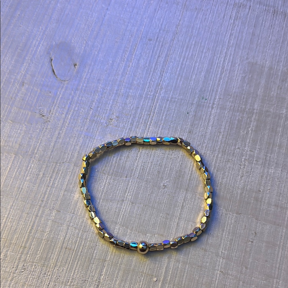 Like new Elegant Gold Beaded stretchy Bracelet